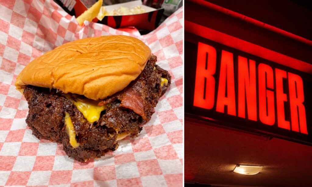 Smoke Burger con carne, formaggio e bacon, affiancato all’insegna rossa Banger.